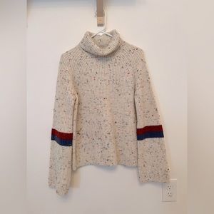 Roolee Cream Confetti Turtleneck.